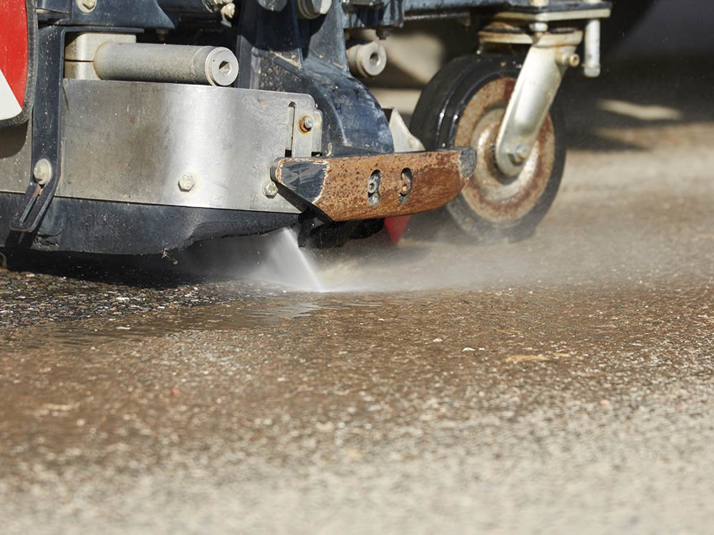 Hochdruckreinigung von Straßen in Melle Detailaufnahme einer Hochdruckwaschanlage zur Reinigung von Straßen- und Asphaltflächen im Raum Melle